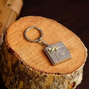 Square Shape Photo Locket Keychain with two pictures and text engraving on front and back, perfect for personalizing as a gift for someone special.