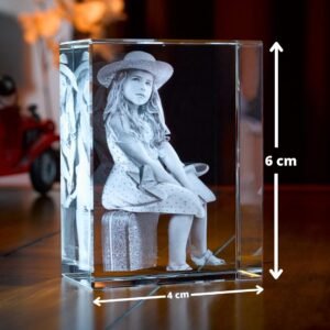 3D laser-engraved crystal block with a custom photo, showcasing precise dimensions of 4x6 cm, against a warm, blurred background of home decor.