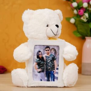 A fluffy teddy bear with a picture of couple on its t-shirt, suitable for all ages, can be used as a decorative piece or a functional toy, perfect gift for Valentine's Day, anniversary, or just because.