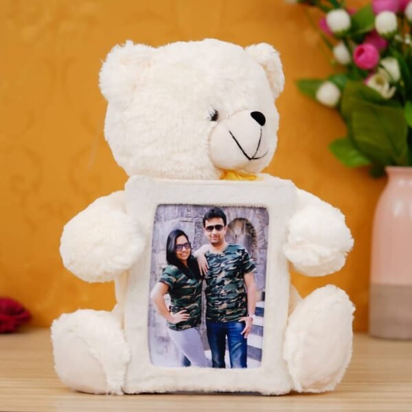 A fluffy teddy bear with a picture of couple on its t-shirt, suitable for all ages, can be used as a decorative piece or a functional toy, perfect gift for Valentine's Day, anniversary, or just because.