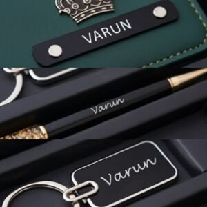 Close-up of engraved wallet, custom pen and personalized keychain with name