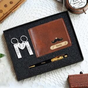 Customized gift set for men featuring a brown leather wallet with Your Name engraved, two keychains with romantic coordinates, and a personalized pen with golden flakes, presented in a sleek black box.