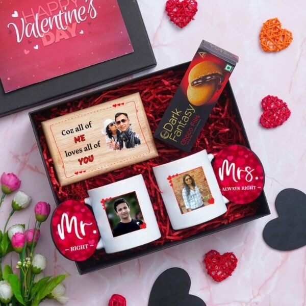 Open Valentine's Day gift set box containing personalized photo wooden plaque, mugs, and chocolates, with 'Mr. Right' and 'Mrs. Always Right' designs, surrounded by romantic decorations.