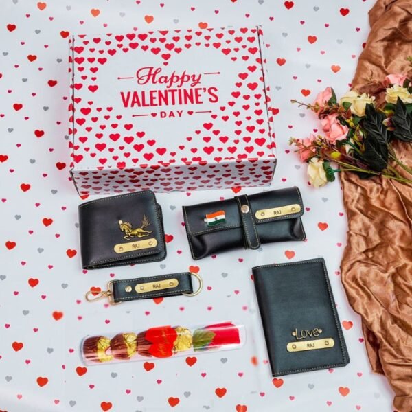 Valentine's Day themed men's gift box with customized accessories including a wallet, passport cover, sunglass case, keychain, and rose chocolate, adorned with your name