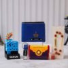 Rakhi gift combo including personalized wallet, keychain, Best Bro 3D pen stand, Rudraksha Rakhi, Kit-Kat chocolate, and Roli Chawal.