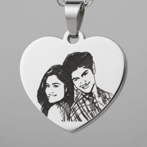 Close-up view of personalized heart photo engraving on stainless steel pendant – custom couple jewelry