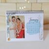 Personalized 2026 table calendar on office desk – custom photo calendar with Design 3 layout.