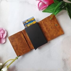 Personalized brown leather wallet with RFID card holder and multiple card slots, open view showing smooth tan finish and credit cards.