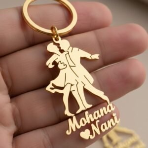 Custom couple name gold keychain held in hand showing premium metal finish