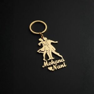 Minimal black background showcasing personalized couple name gold keychain