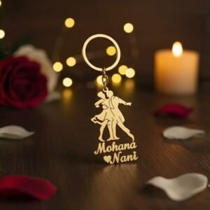 Romantic personalized couple keychain displayed with candle and rose petals