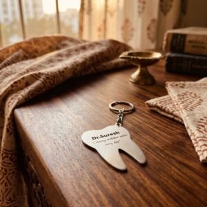 Personalized Dentist Tooth Metal Keychain — lifestyle photo in real gifting setting