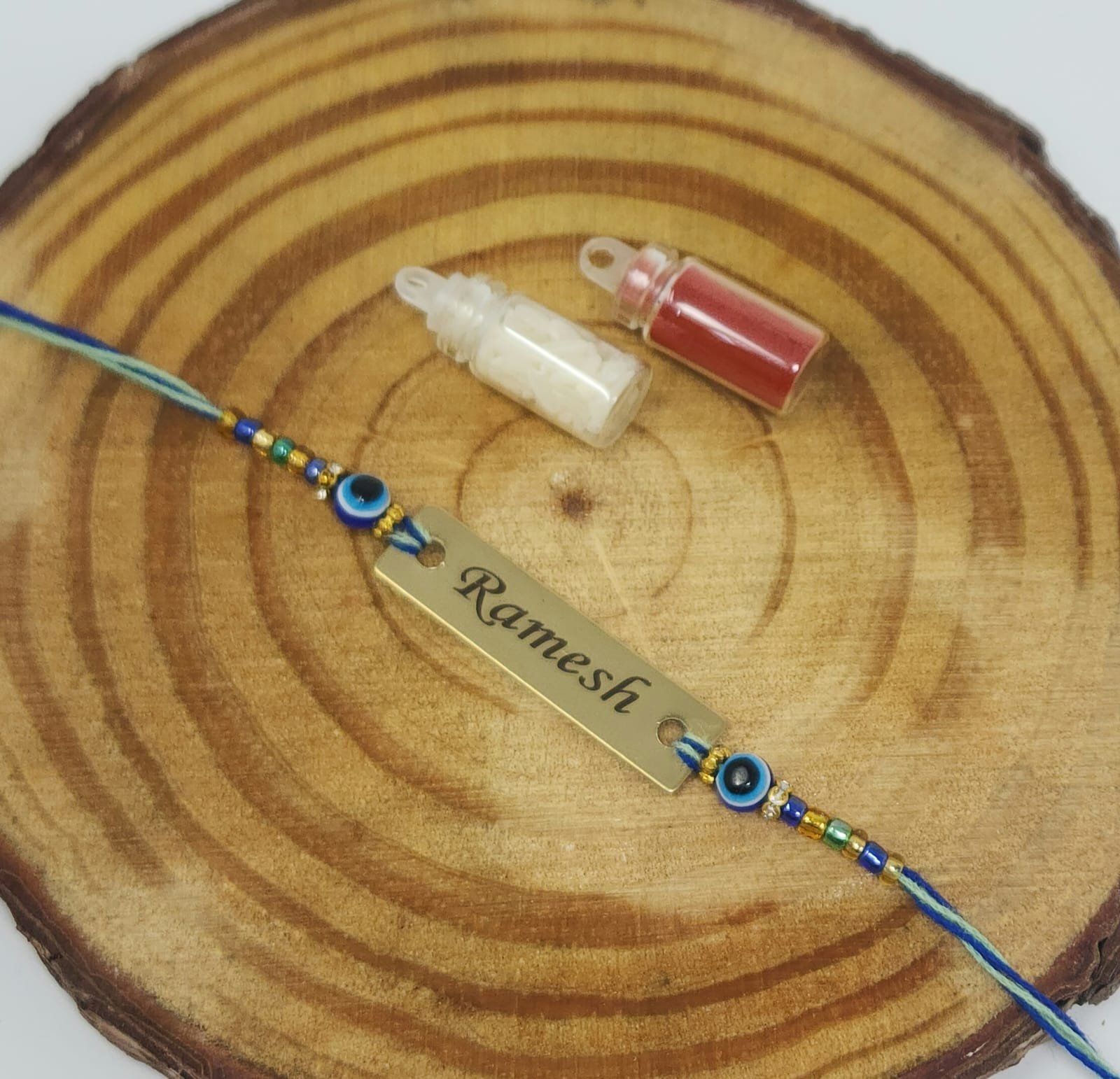 Personalised Evil-Eye Thread Rakhi with Name - Image 2