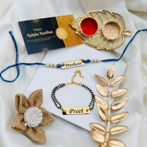 Personalised Bhaiya Bhabhi Rakhi Set – Name Rakhi + Bhabhi Bracelet with Roli-Chawal — lifestyle photo in real gifting setting