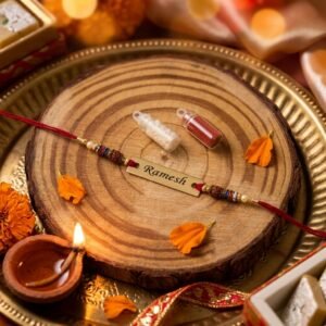 Personalised Rudraksha Thread Rakhi with Roli-Chawal & Name — close-up detail view showing personalisation and craftsmanship