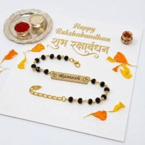 Personalised Black-Bead Gold-Chain Name Bracelet Rakhi — close-up detail view showing personalisation and craftsmanship