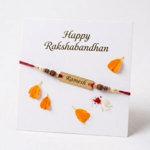 Personalised Rudraksha Thread Rakhi with Roli-Chawal & Name — close-up detail view showing personalisation and craftsmanship