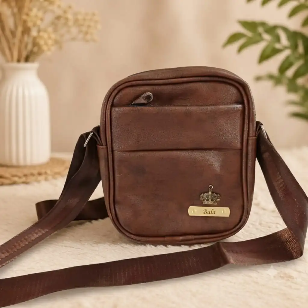 Personalised brown crossbody sling bag for men with name plate and charm