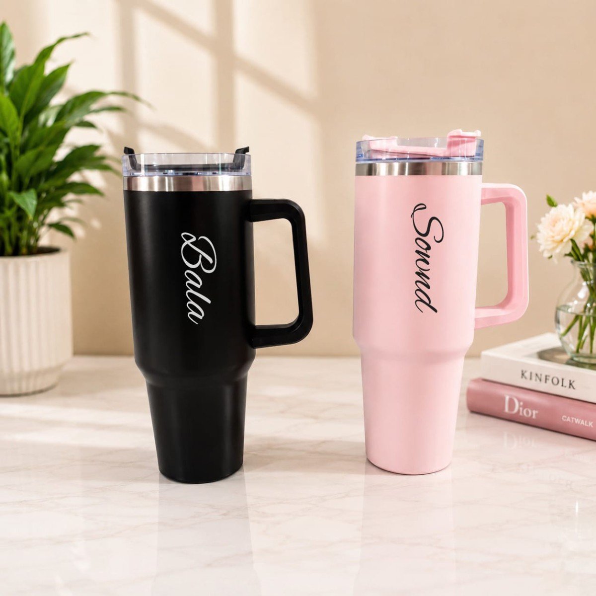 Black and pink personalised 40oz tumblers with names Bala and Sonnd
