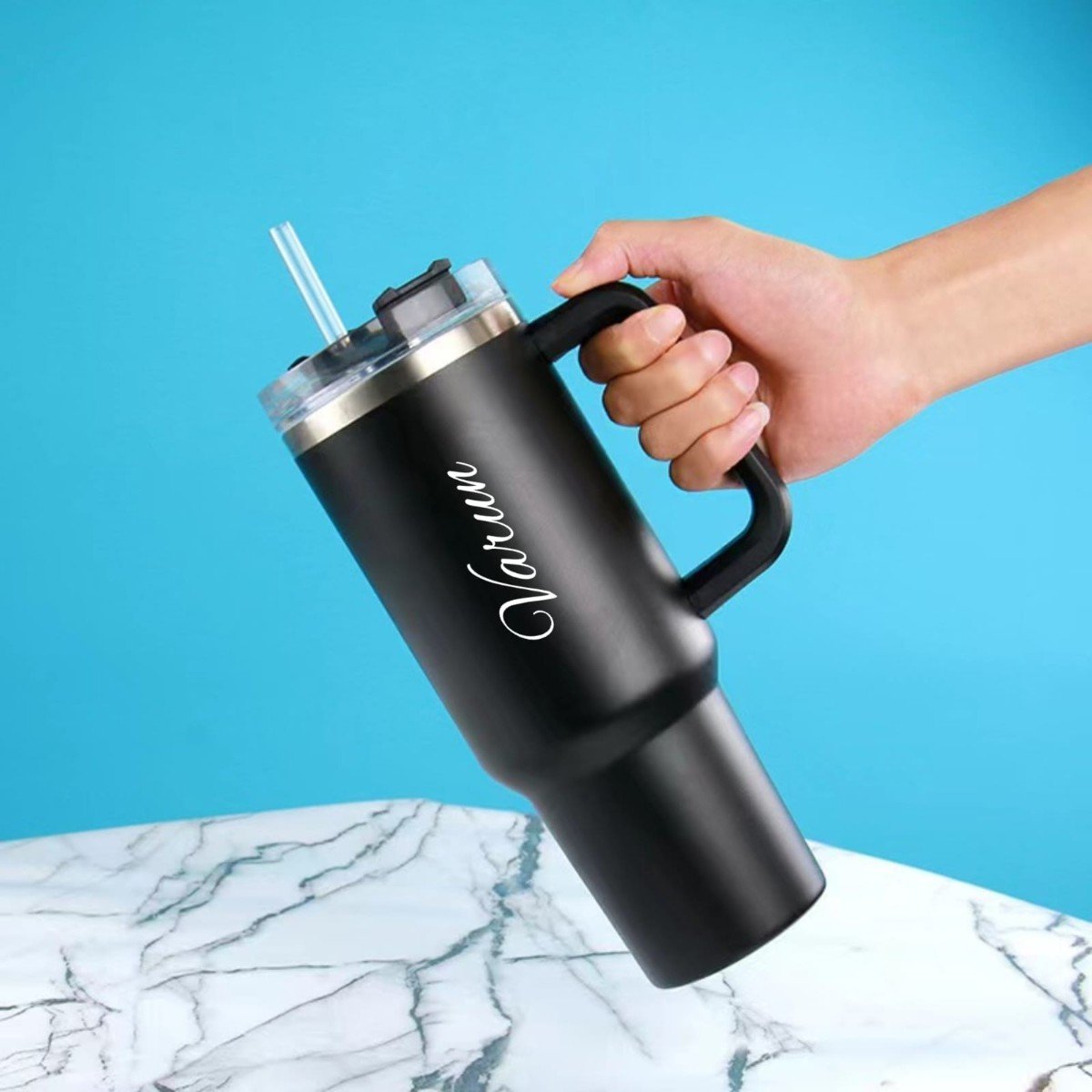 Black 40oz insulated tumbler with handle and straw, personalised with name Varun