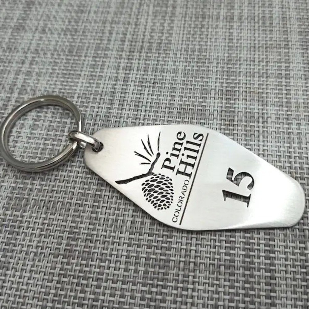 Stainless steel motel key tag keychain engraved with logo and number 15
