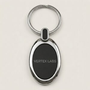 Oval metal keychain with a company name laser engraved on the black panel