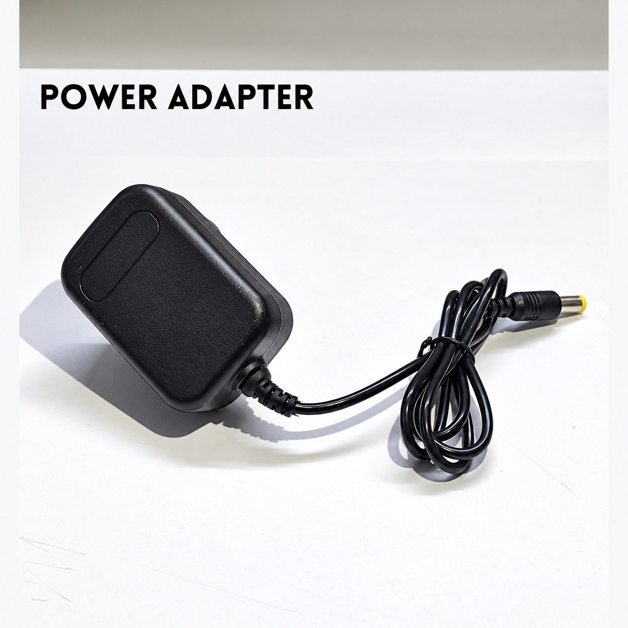 Power adapter included with the LED desk name plate